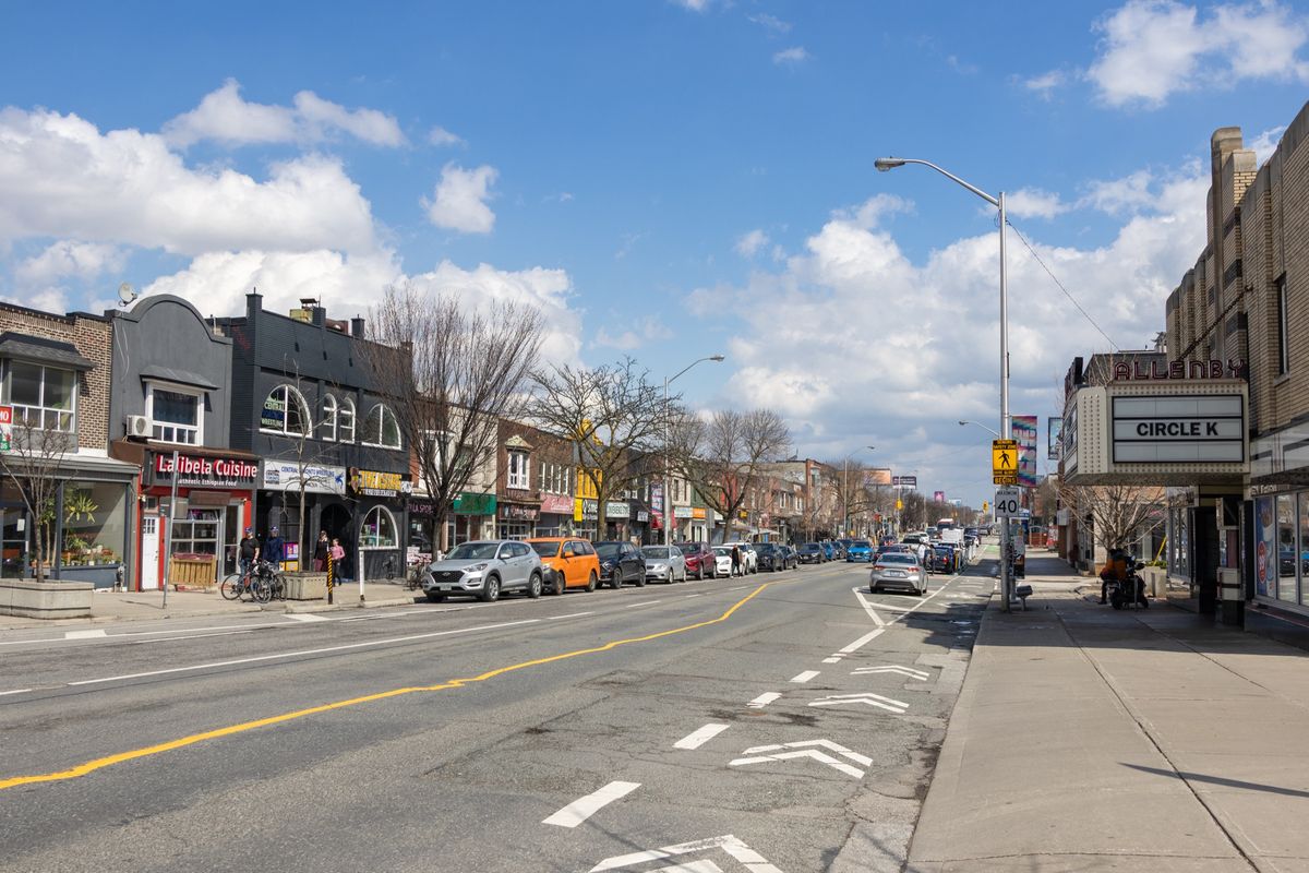 Shops along Danforth Avenue near Greenwood Avenue, looking east.
